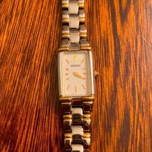 Seiko women’s watch. Gold and silver tone. Retails $120